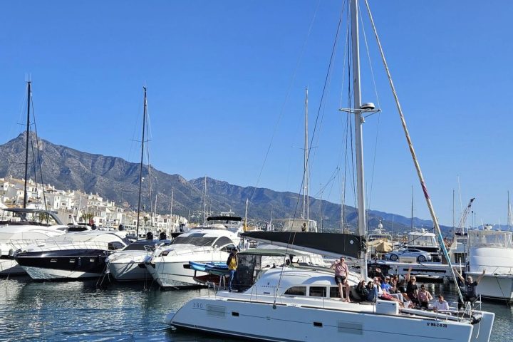 a boat is docked next to a body of water