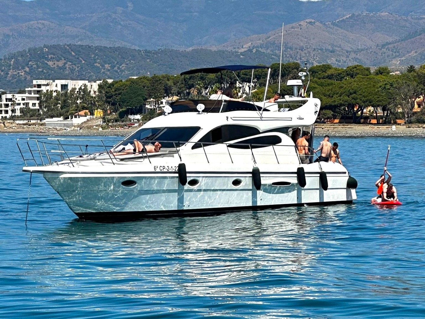 a small boat in a large body of water