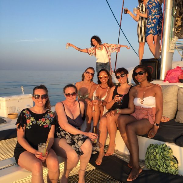 a group of people sitting posing for the camera