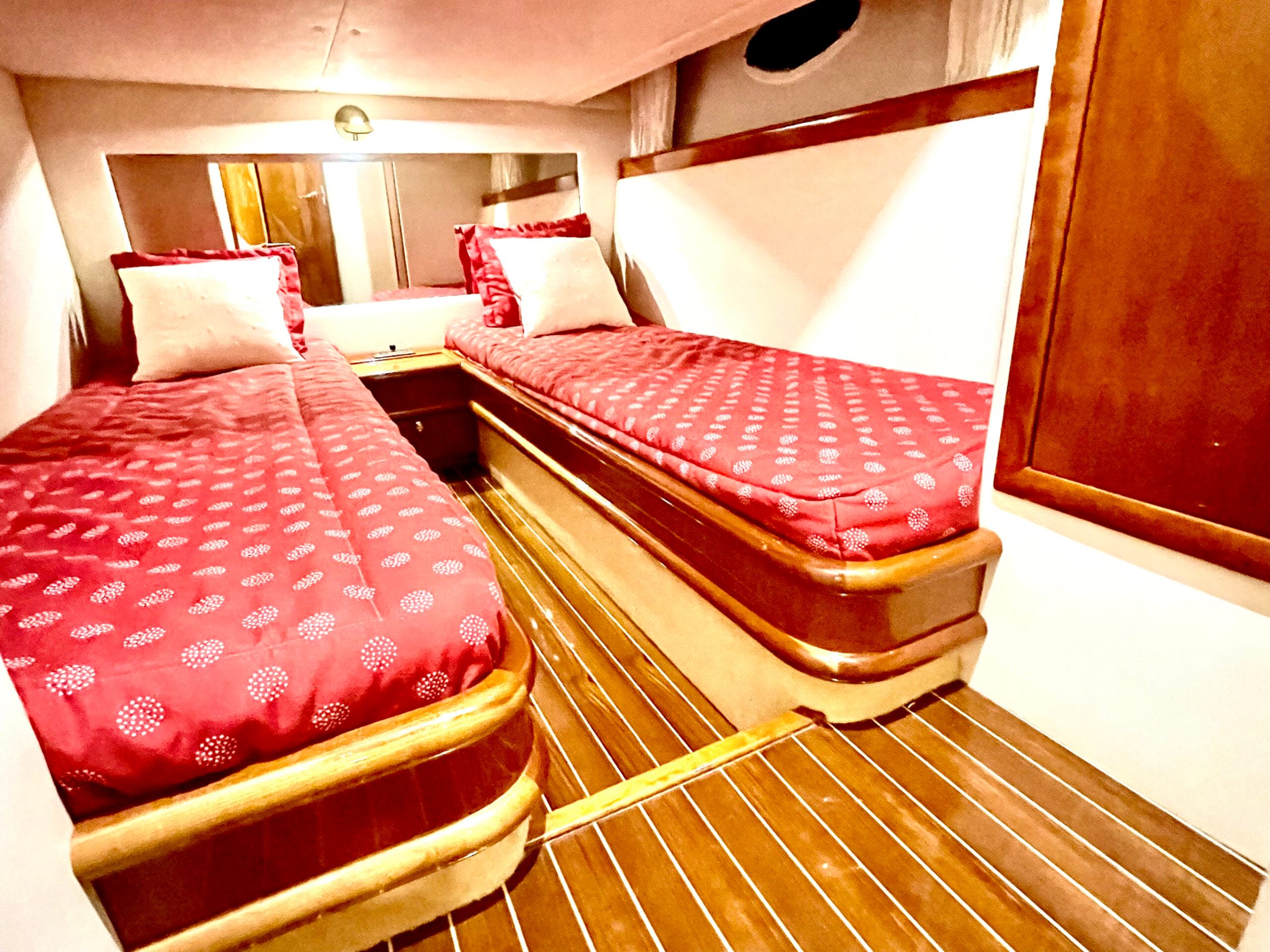 two beds inside a boat