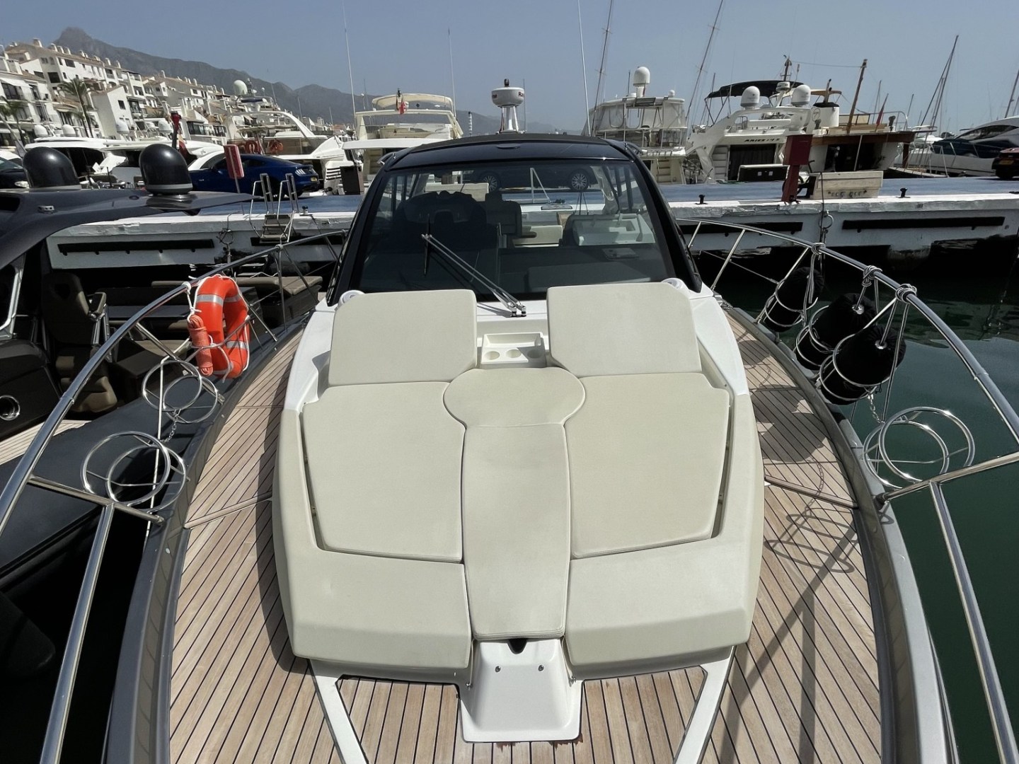 a boat sitting on top of a car