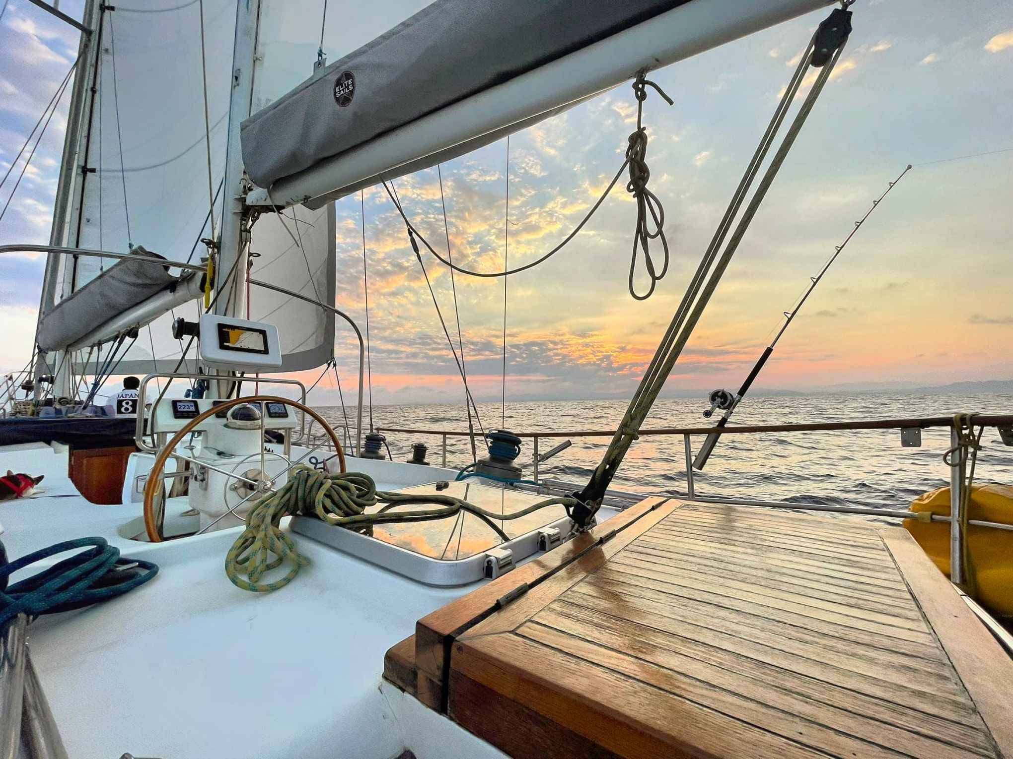 a boat is docked next to a body of water