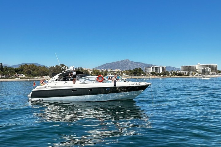 a small boat in a body of water