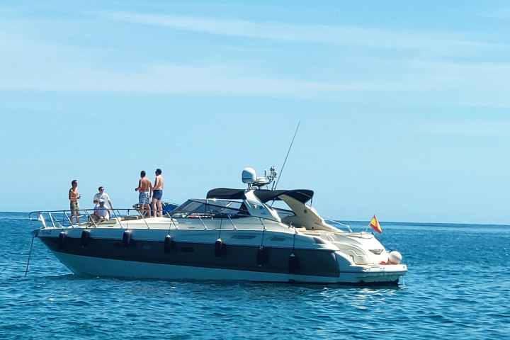 a small boat in a large body of water