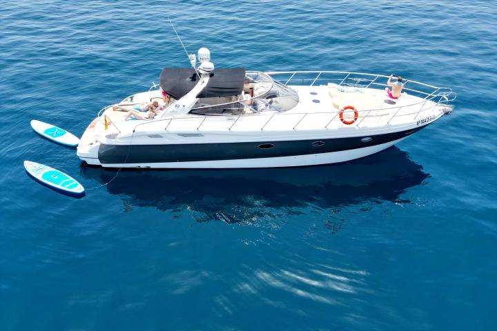 a small boat in a body of water