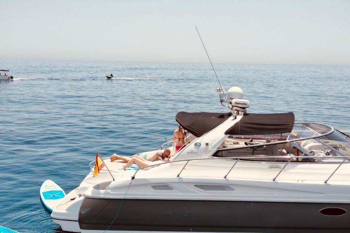 a small boat in a body of water