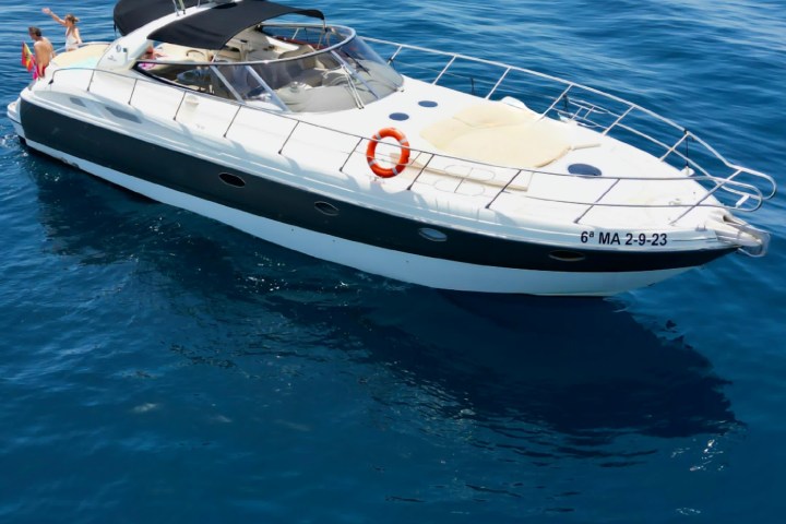 a small boat in a body of water