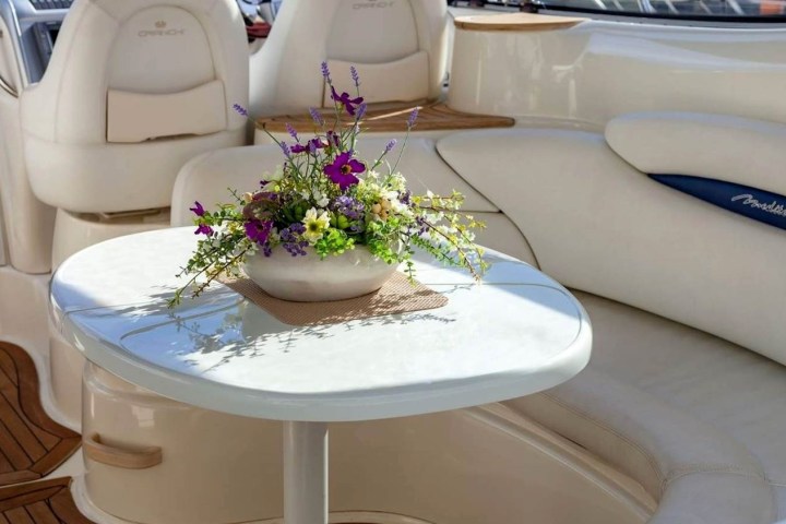 a cake sitting on top of a car