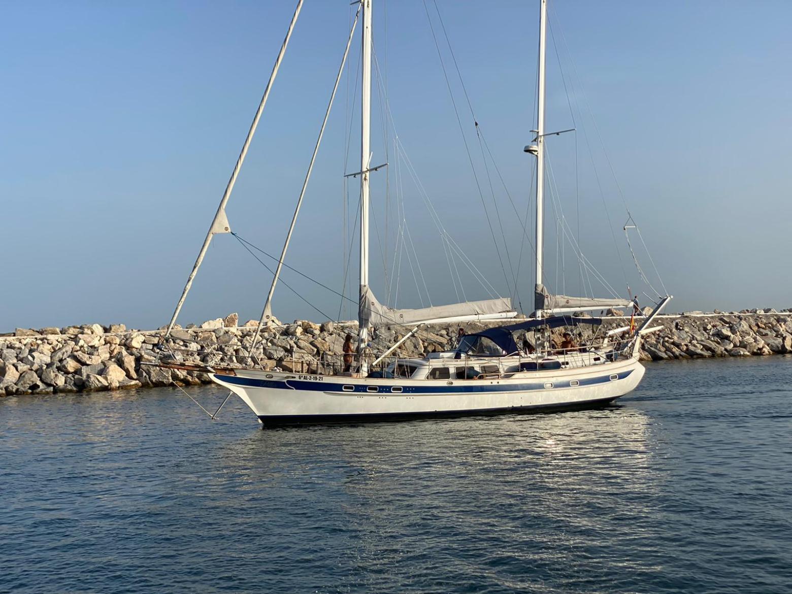 a small boat in a large body of water