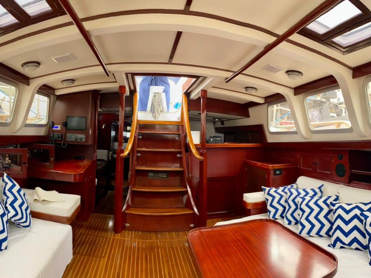 a train that is sitting on a chair in a room