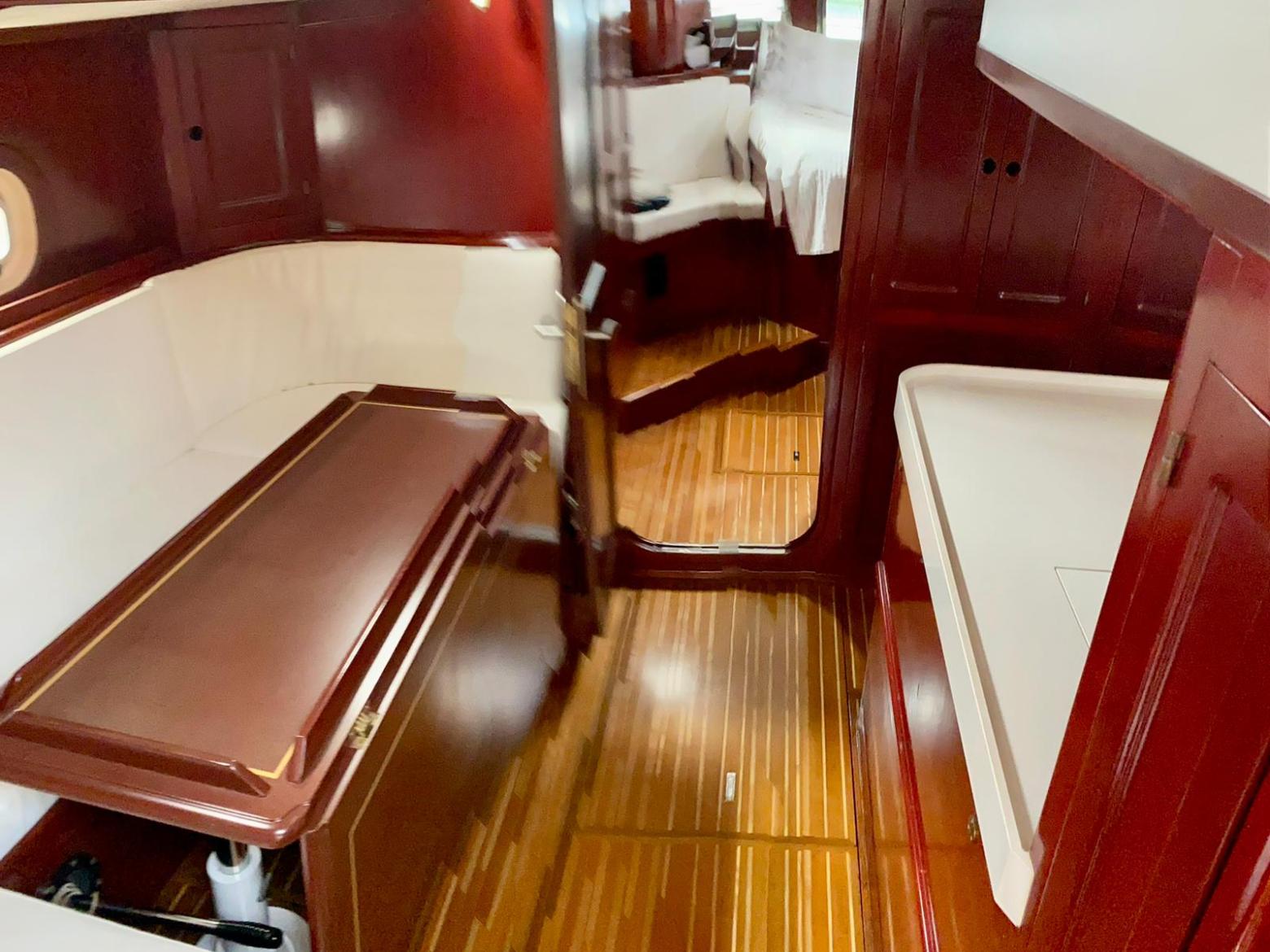 a chair sitting in front of a mirror