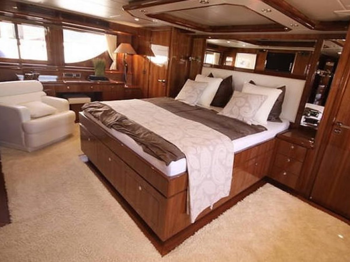 a bedroom with a large bed in a room