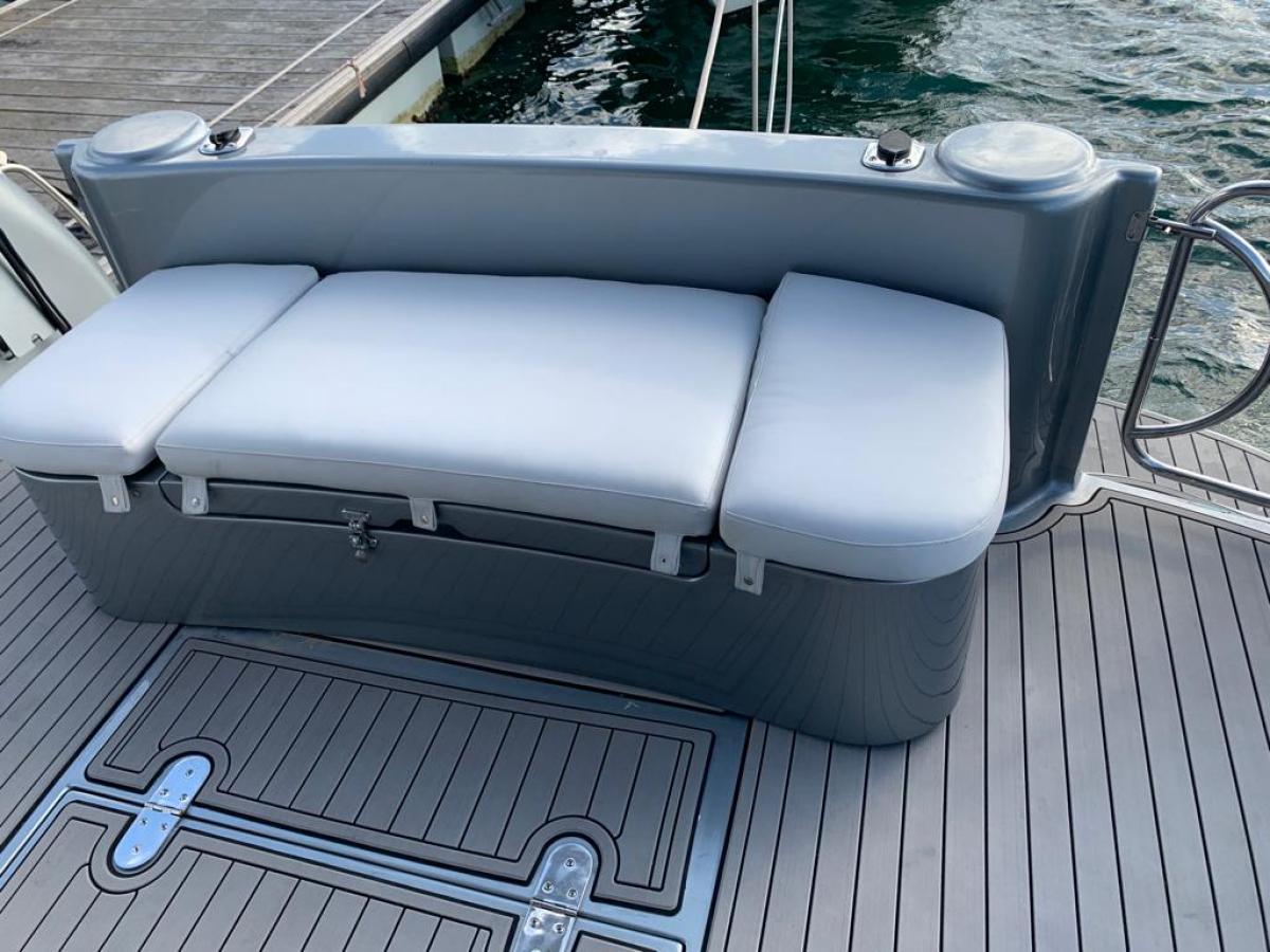 a boat sitting on top of a car