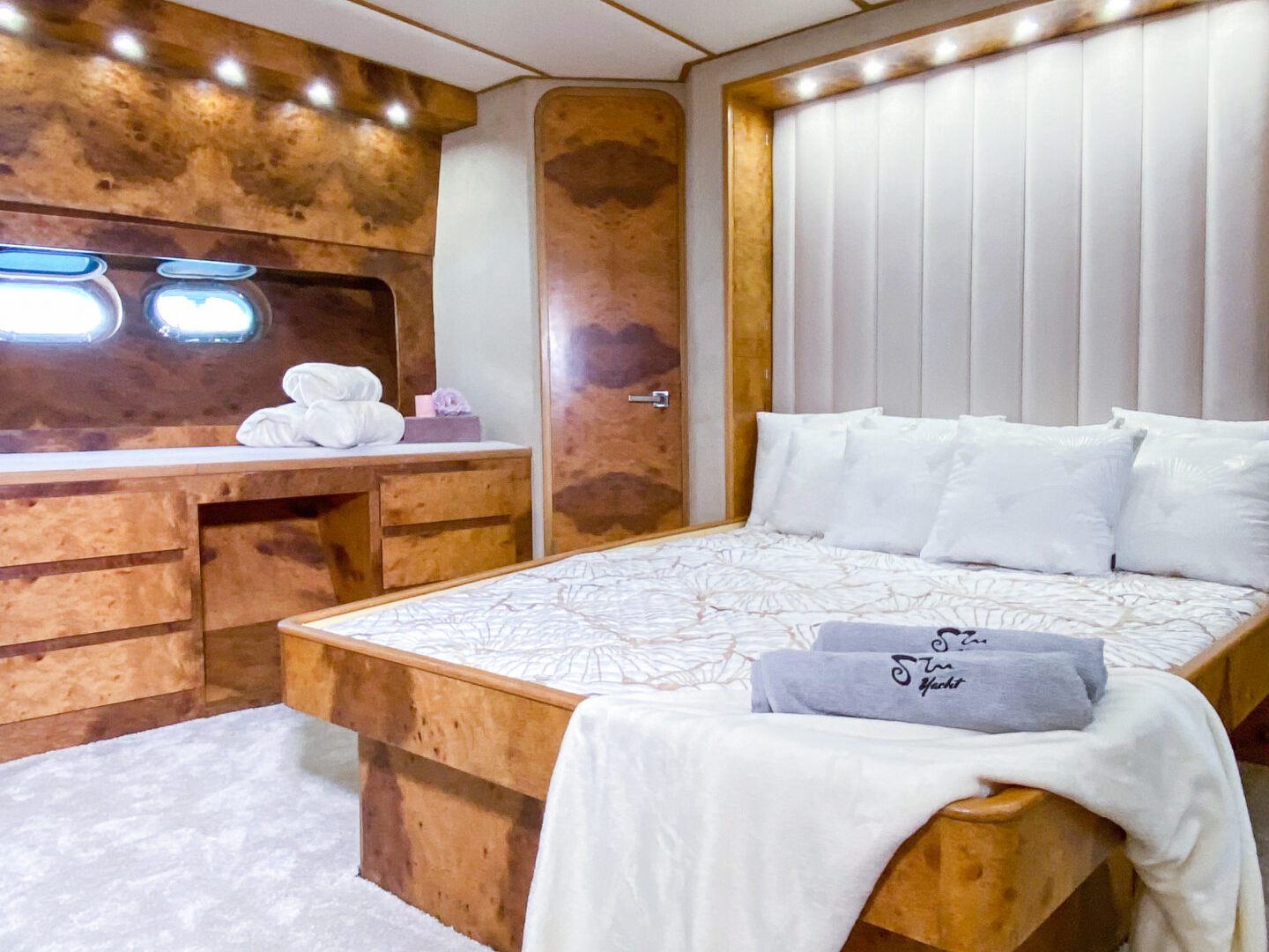 a bedroom with a bed in a room