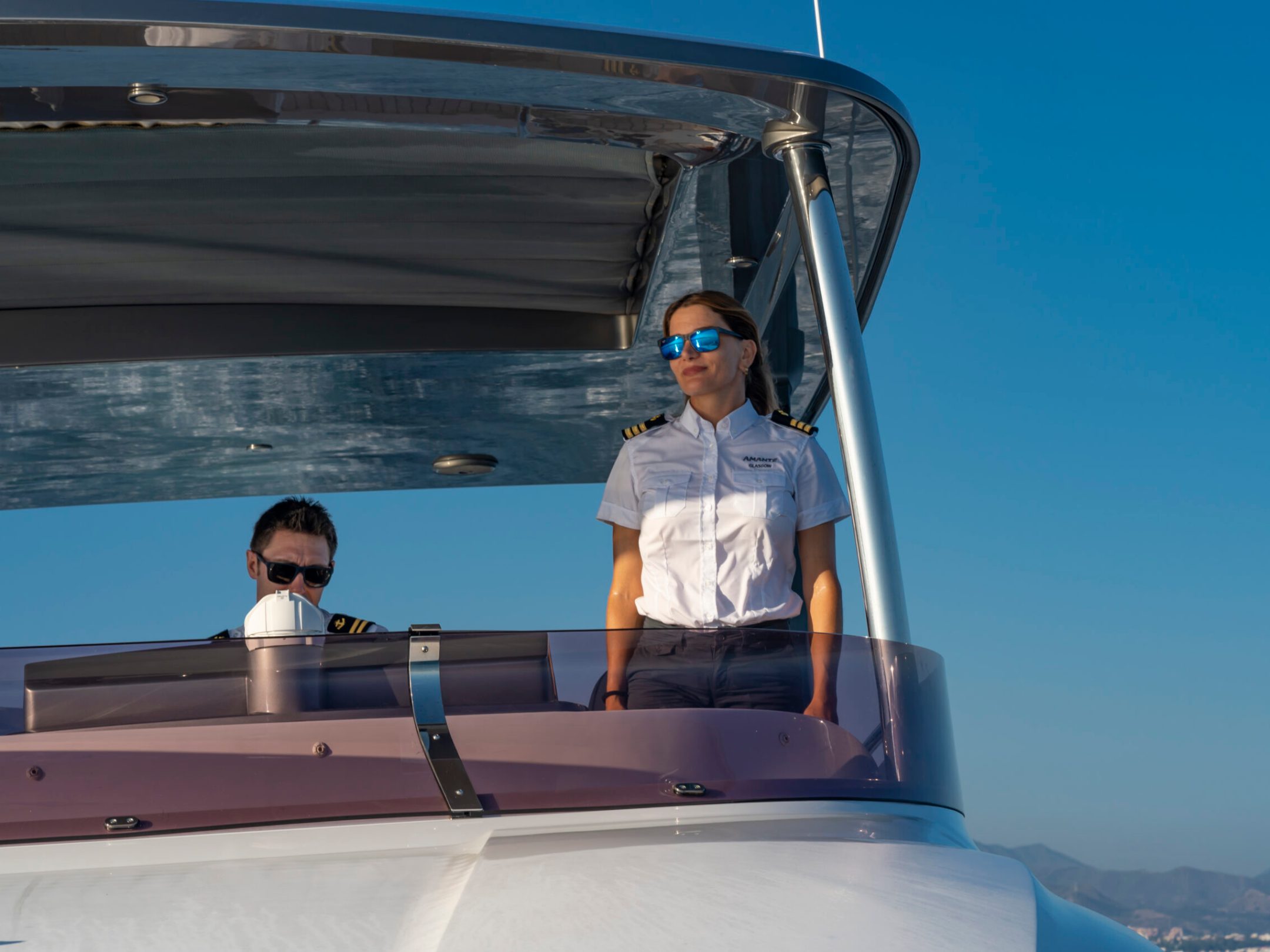 a man riding on the back of a boat