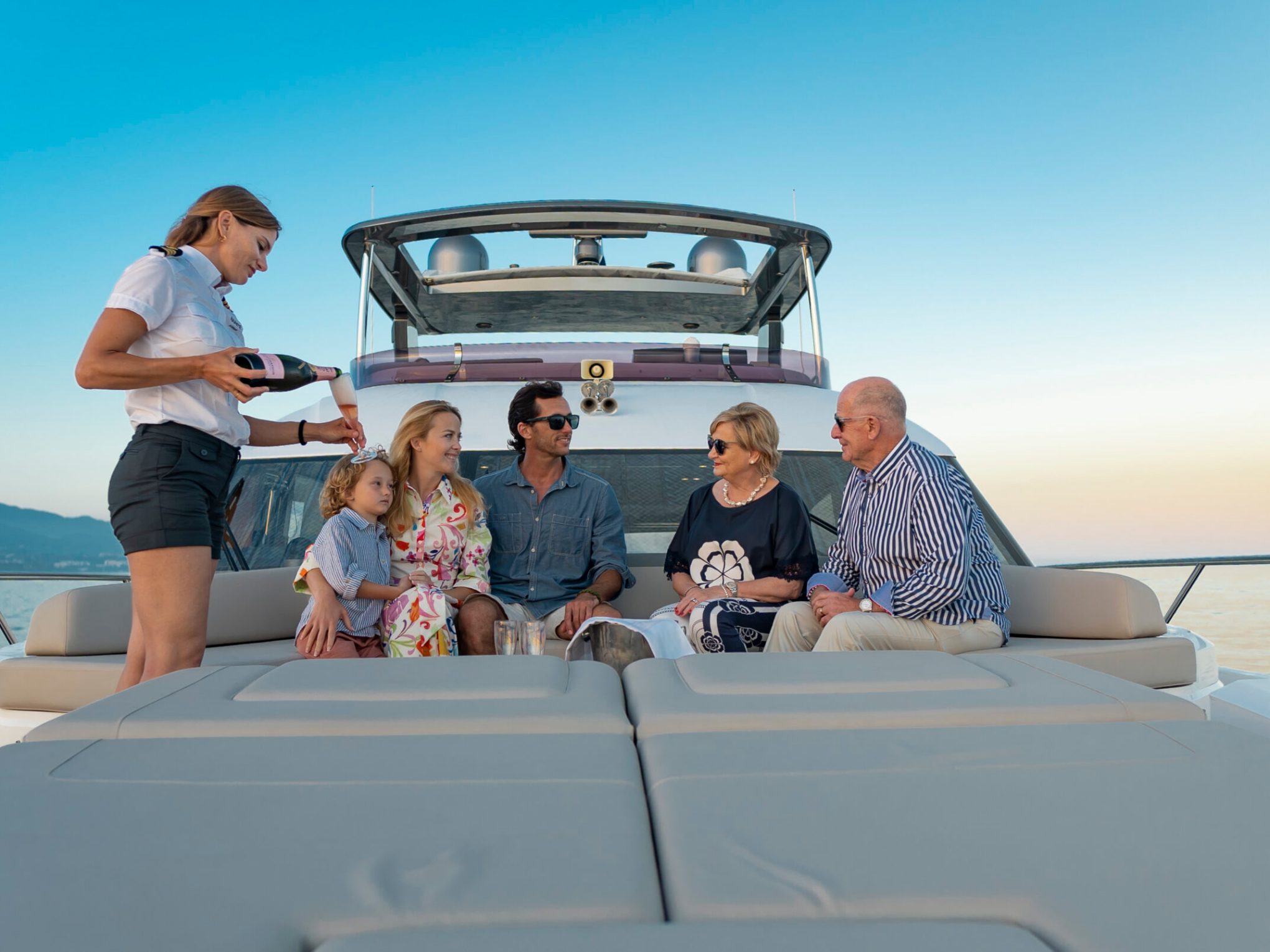 a group of people sitting on a boat