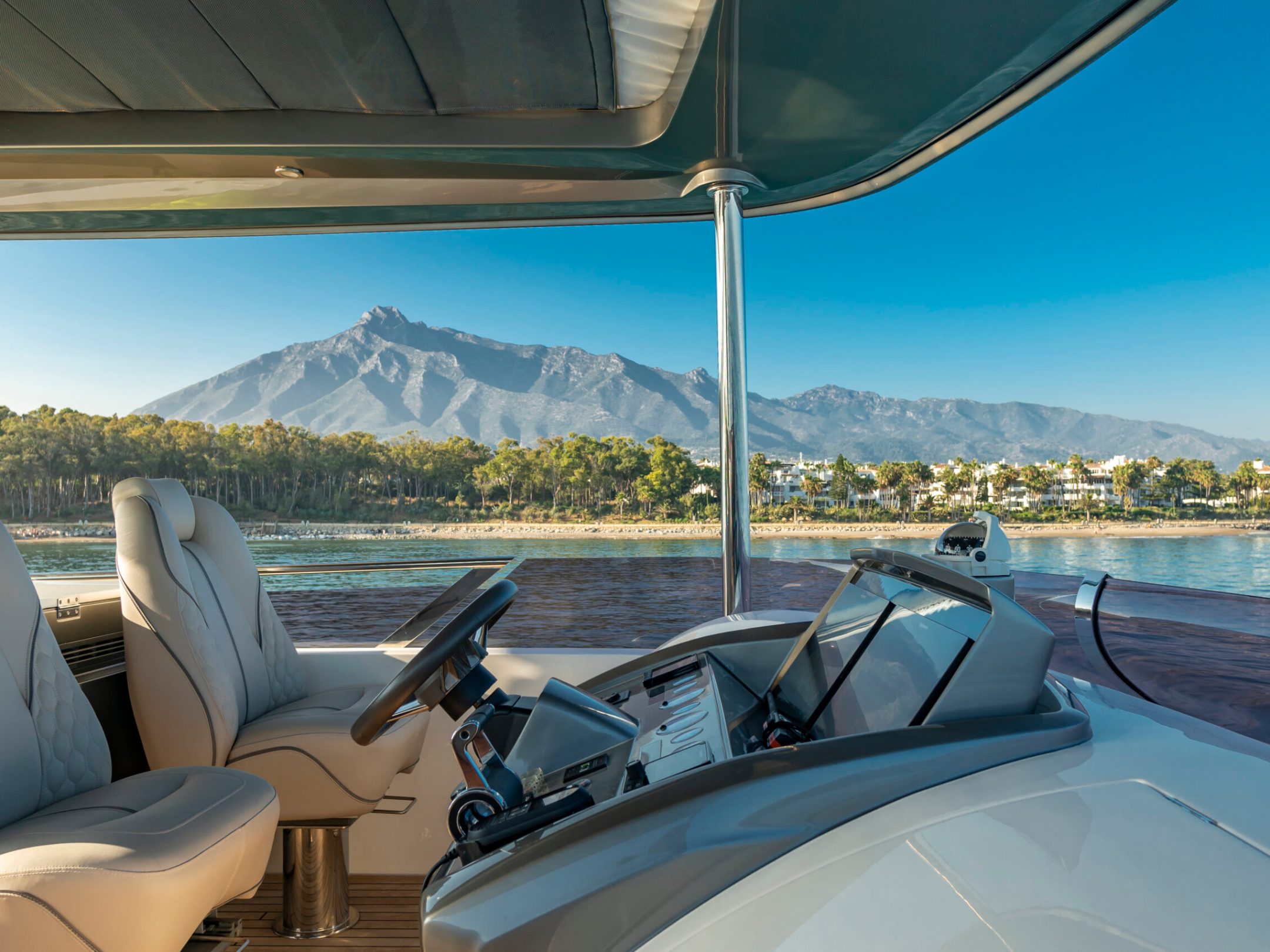 a close up of a boat next to a body of water