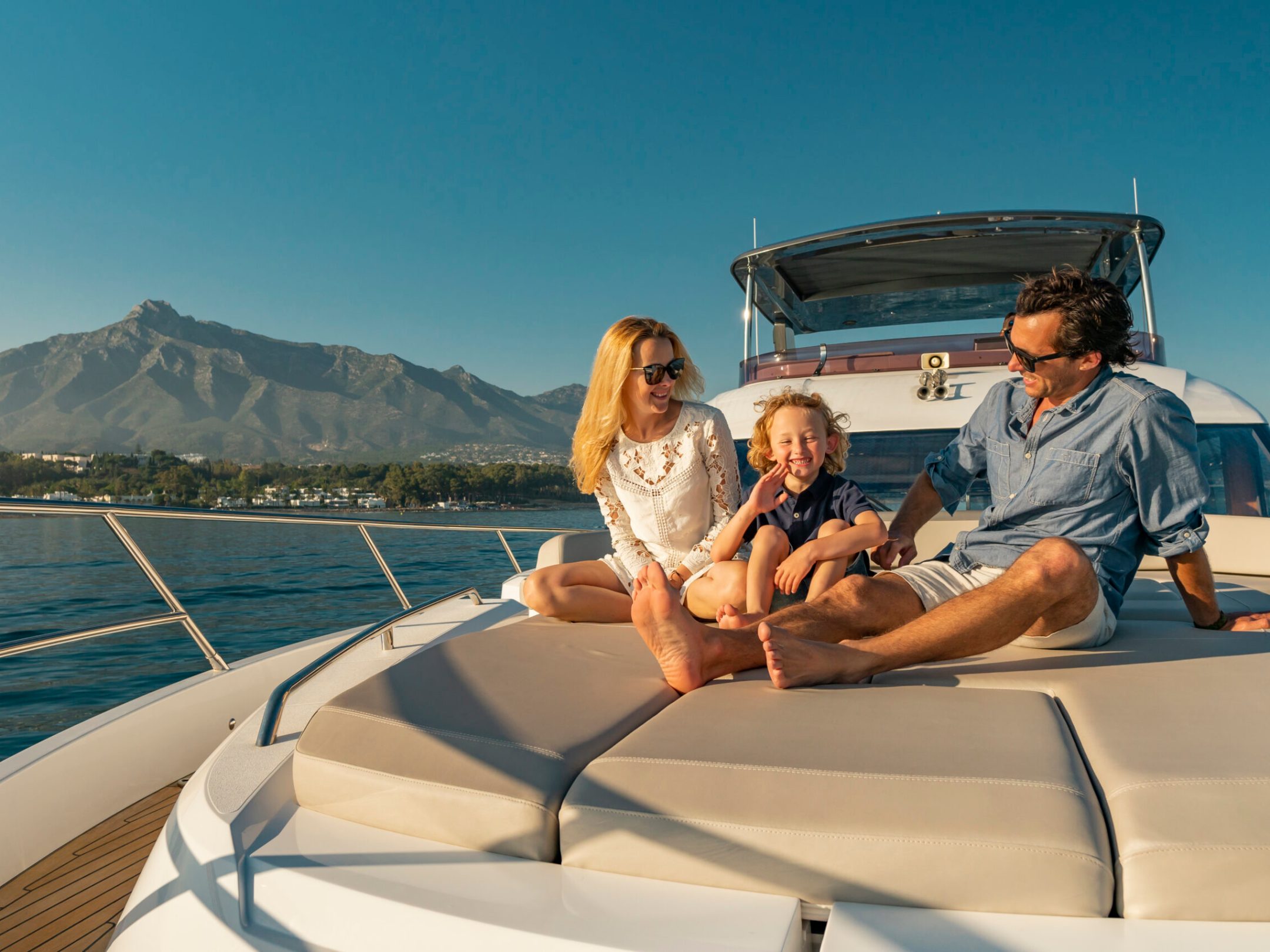 a couple of people that are sitting on a boat in the water