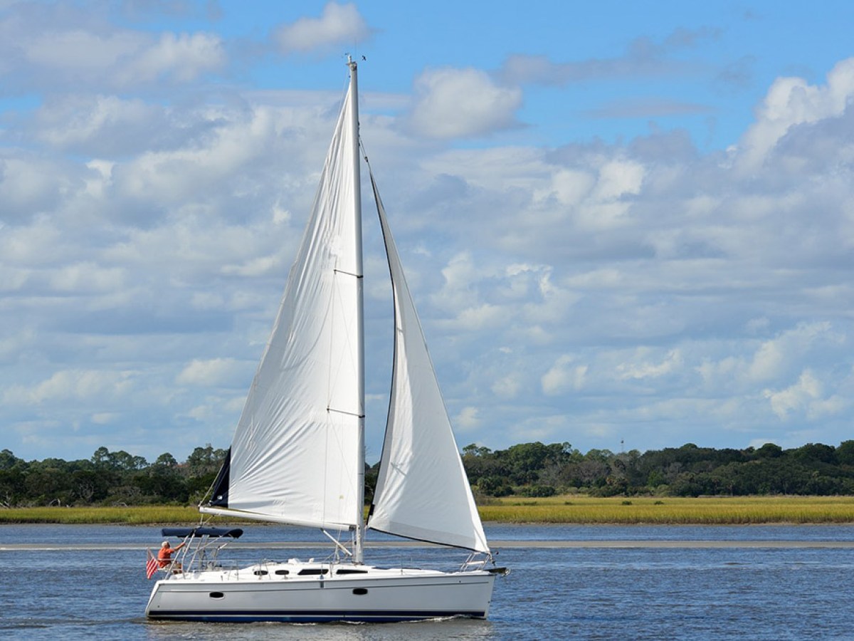a small boat in a large body of water