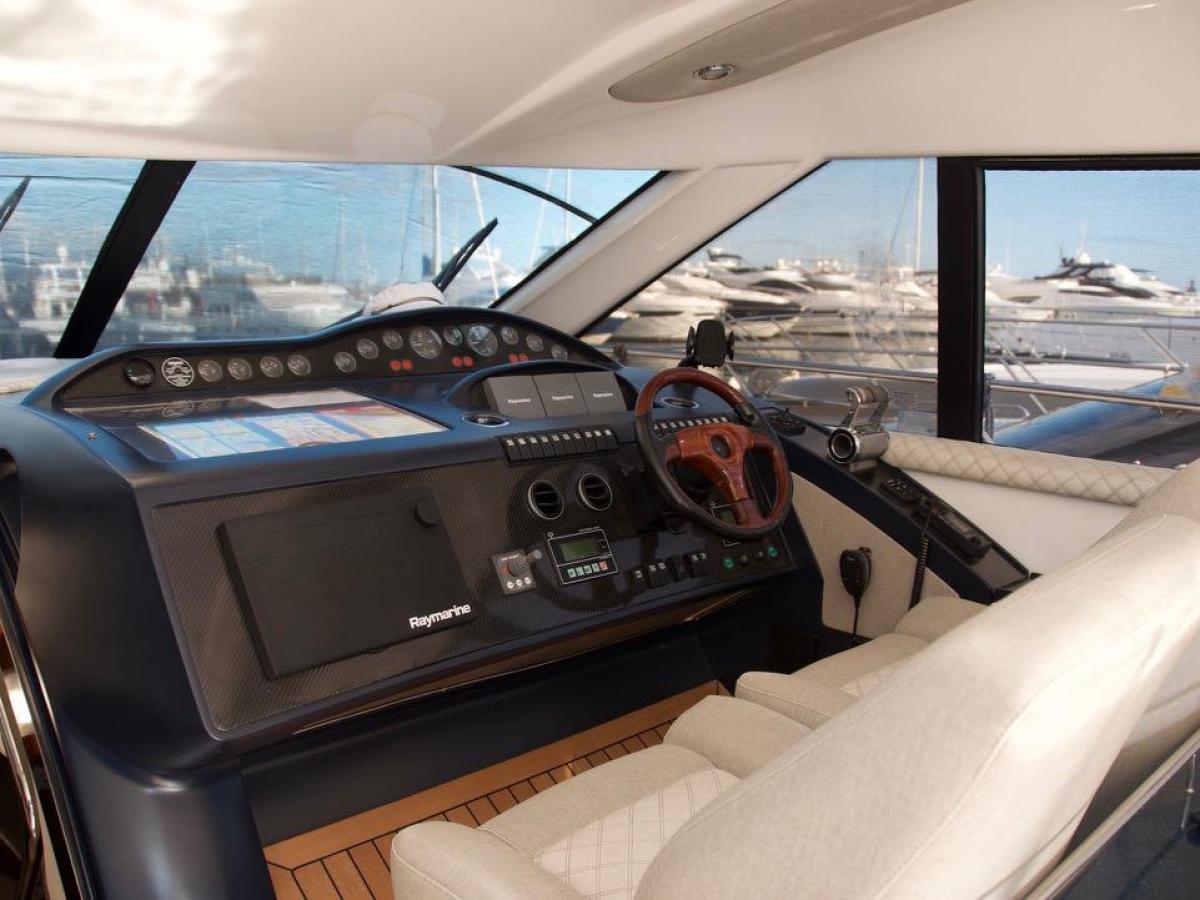 a large jetliner sitting on top of a bed next to a window