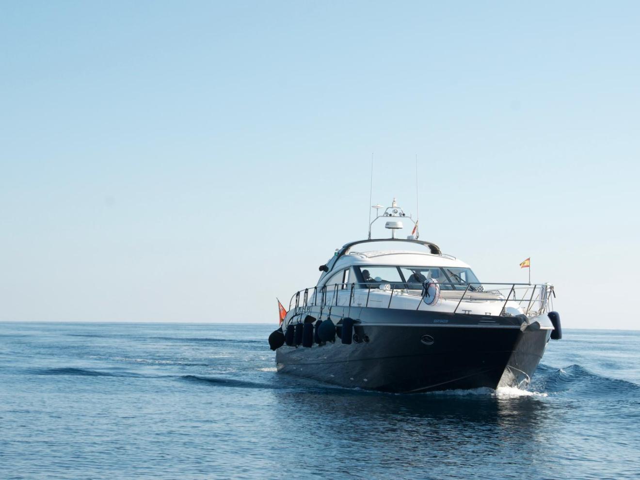 a small boat in a large body of water