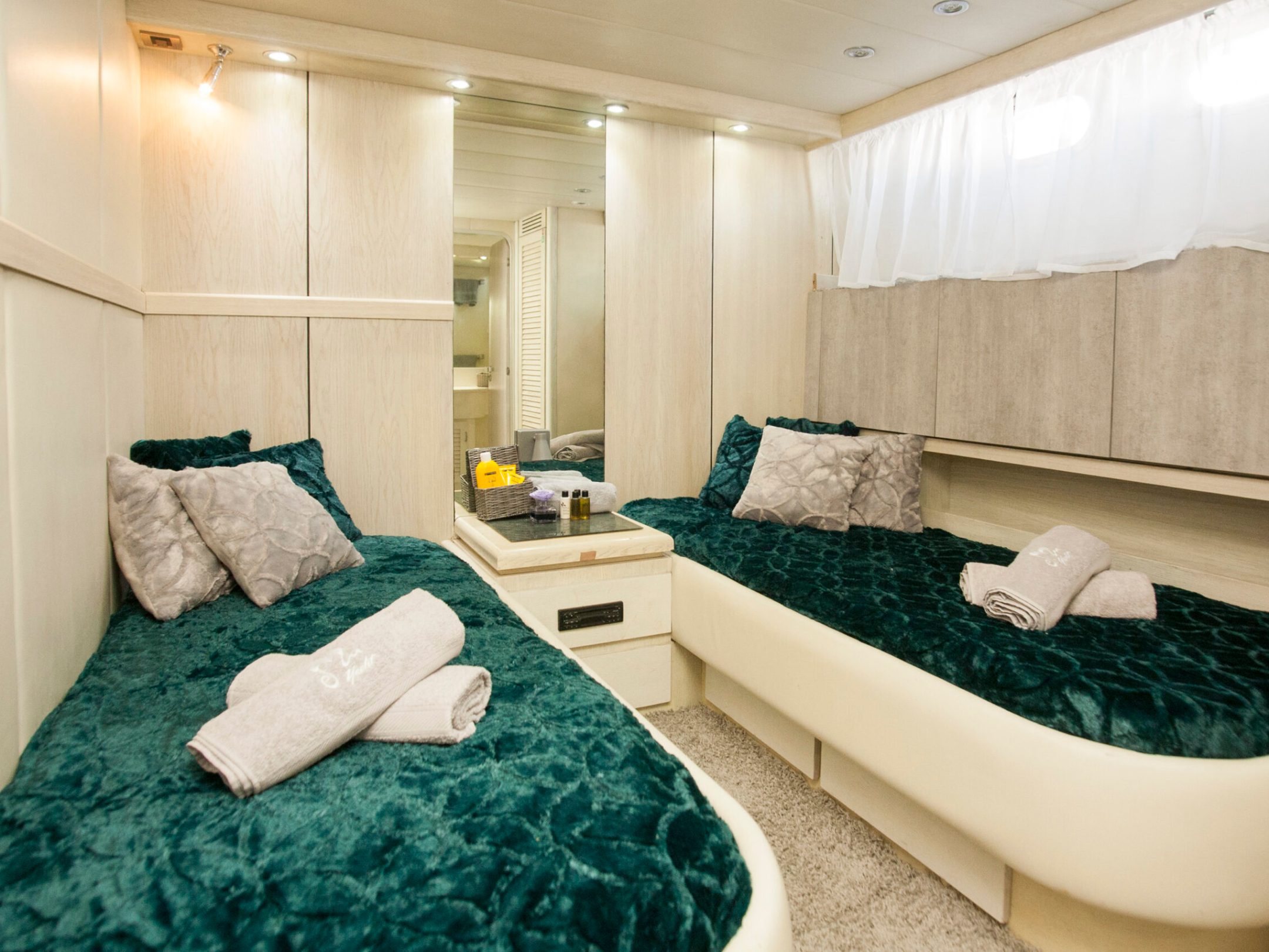 a bedroom with a bed and a mirror