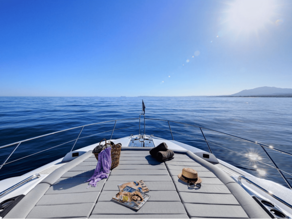 a boat is docked next to a body of water