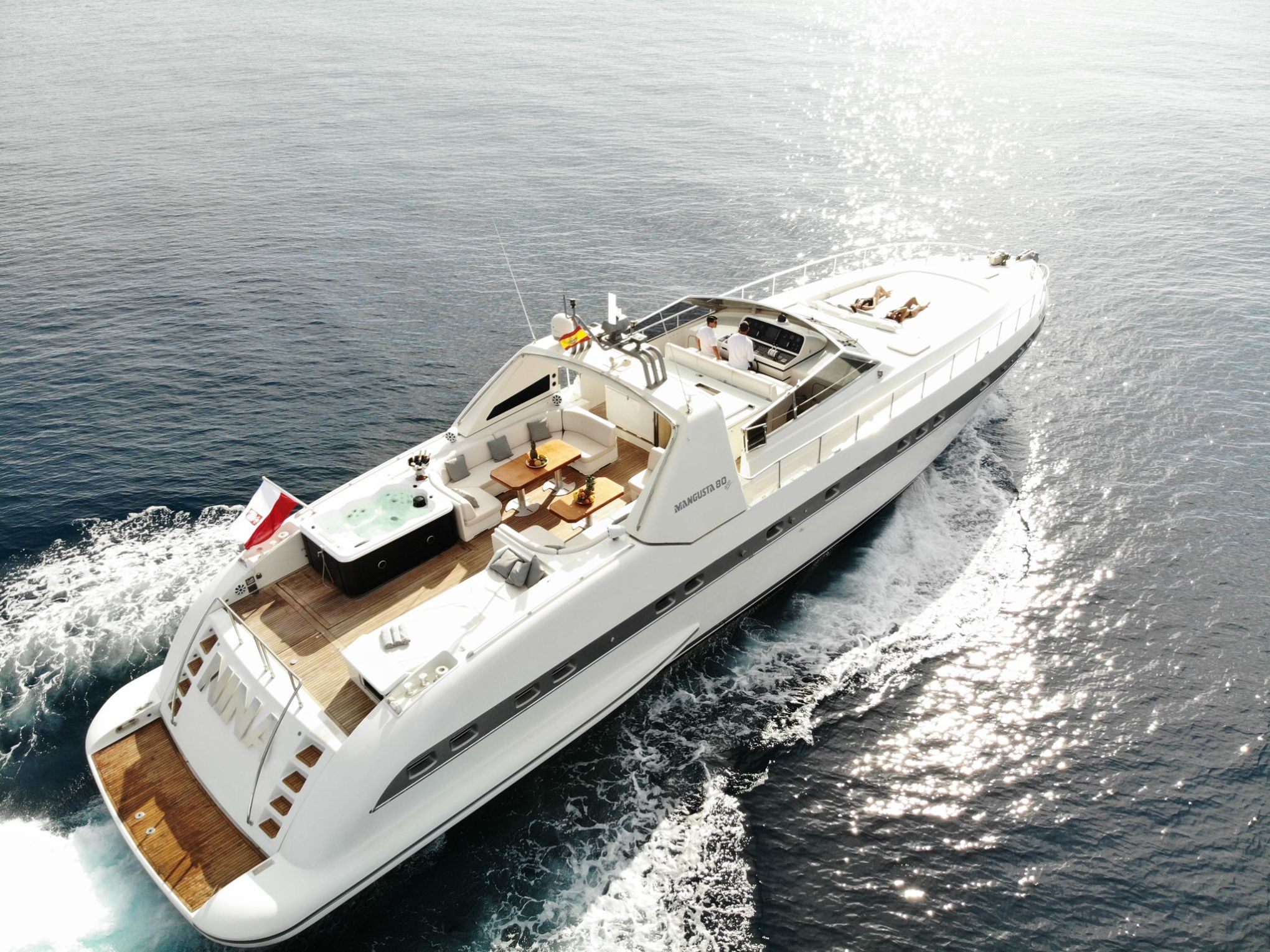 a close up of a boat next to a body of water