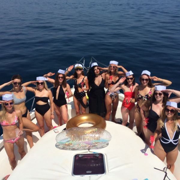 a group of people swimming in a body of water