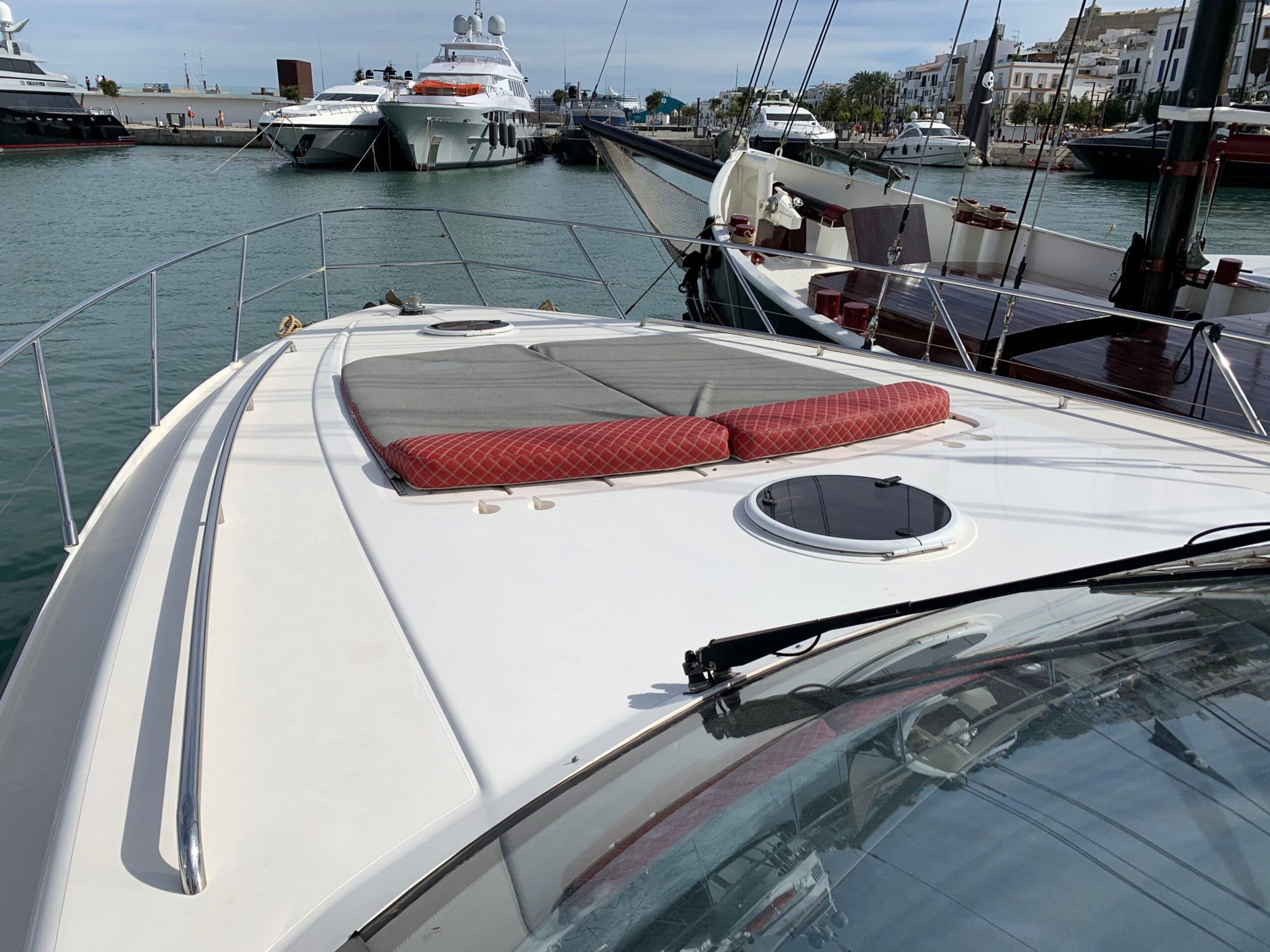 a boat is docked next to a body of water