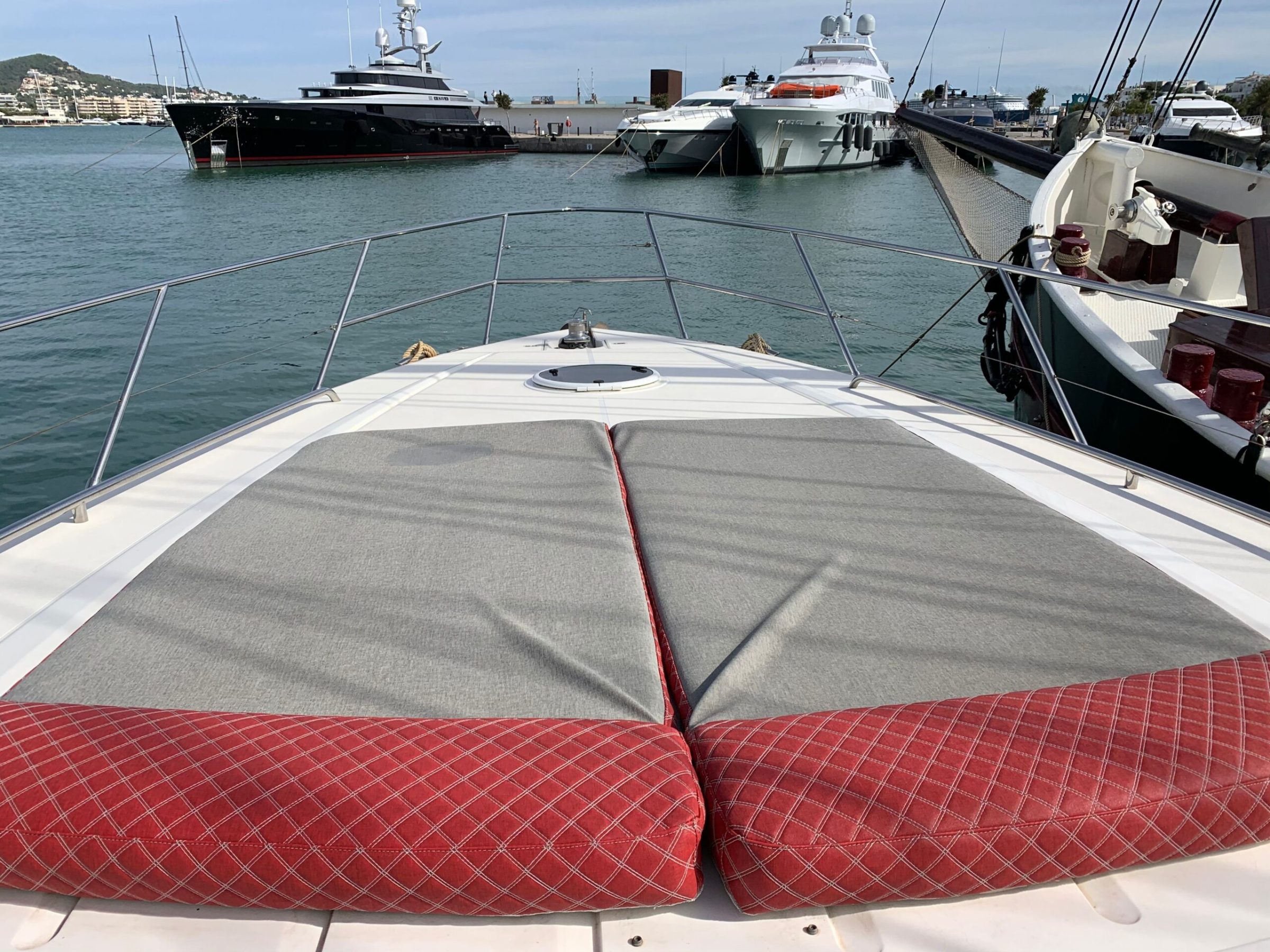 a boat is docked next to a body of water