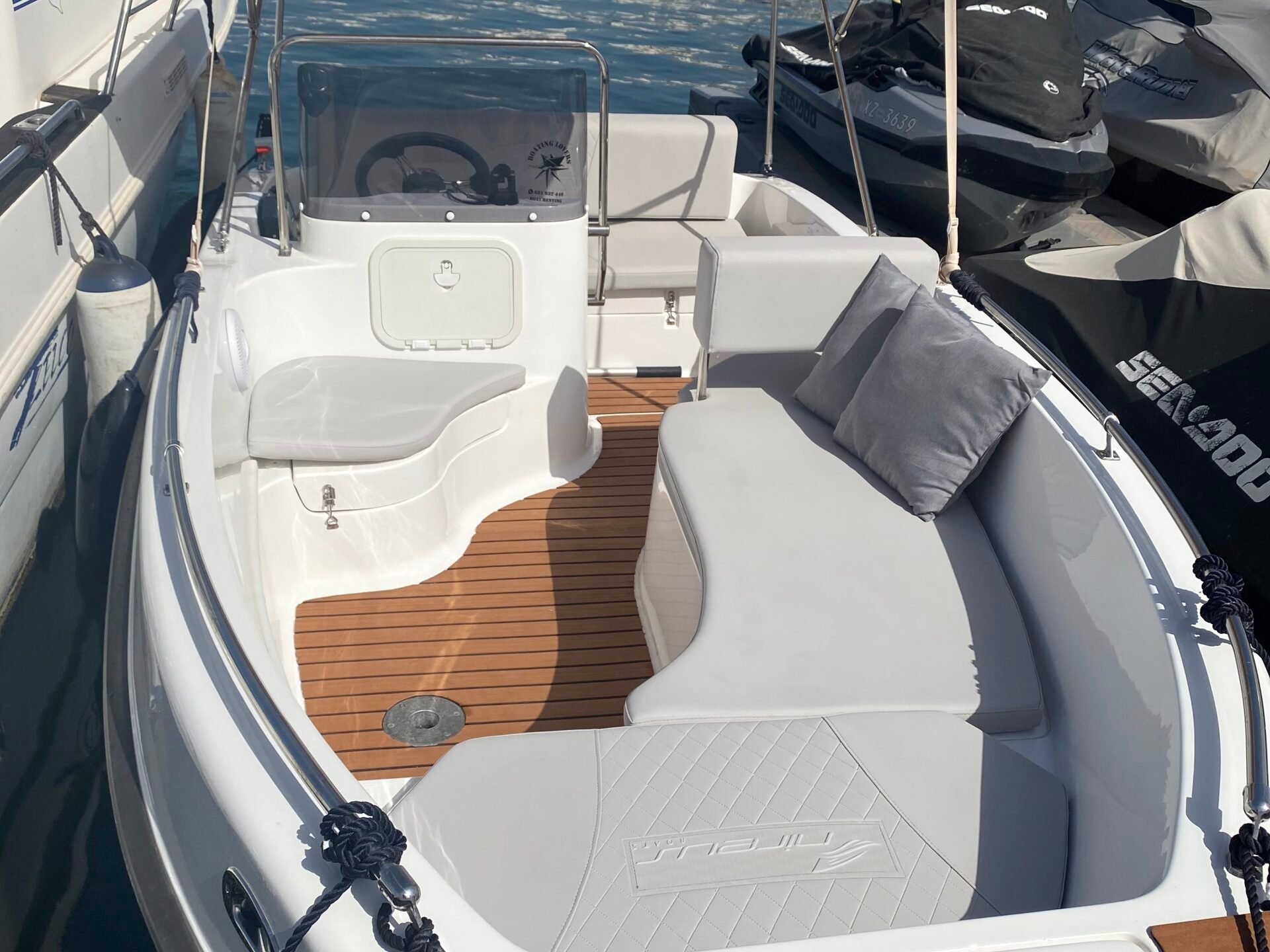 a boat parked next to a bicycle