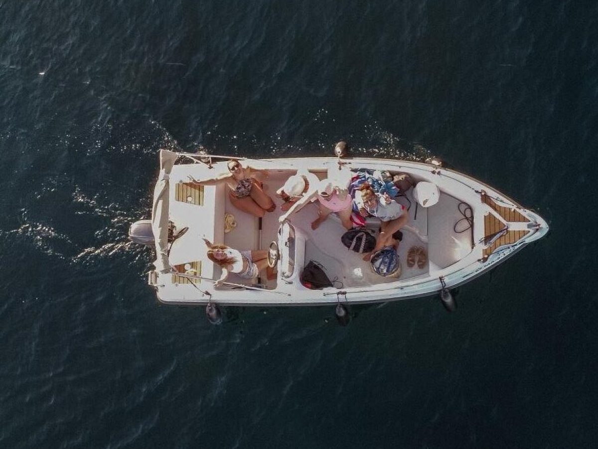 a small boat in a body of water