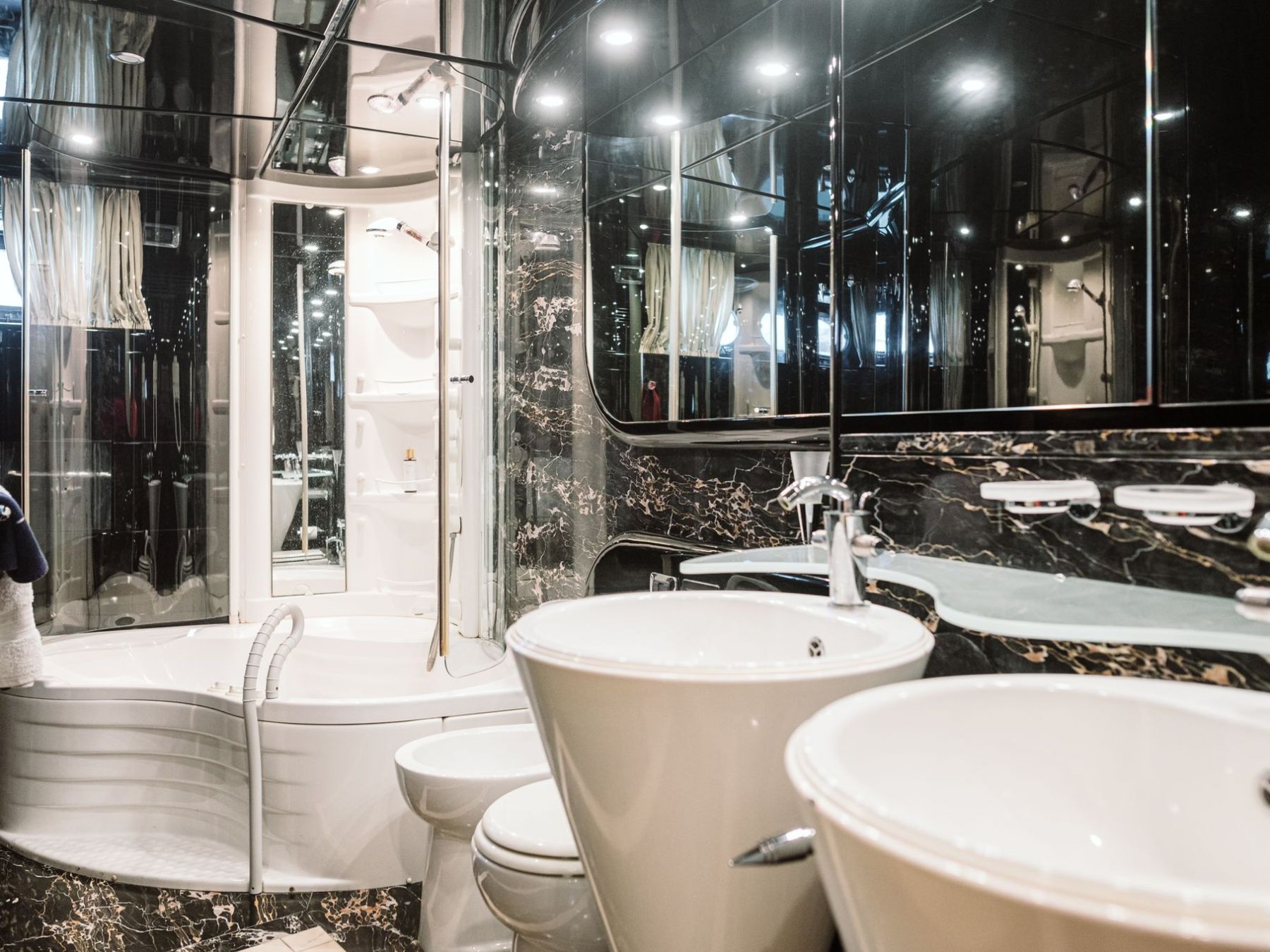 a large tub next to a window