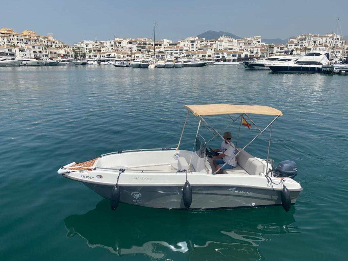 a small boat in a body of water