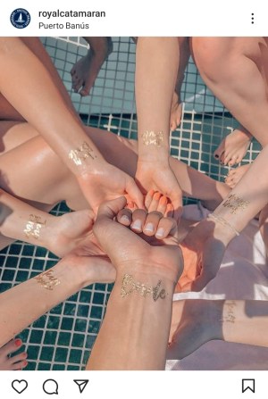 a woman sitting on a table