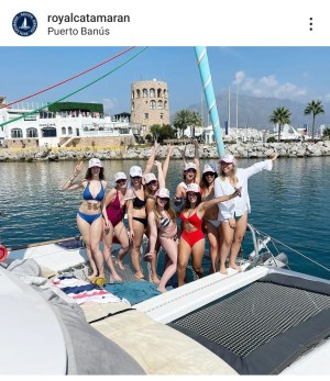a group of people on a boat in the water