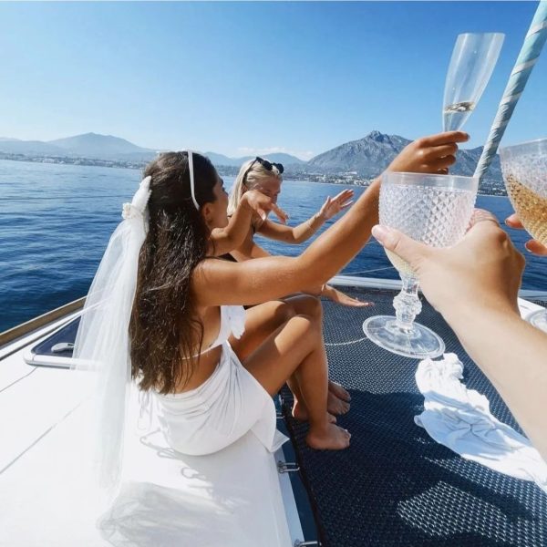 a person sitting on a boat in the water