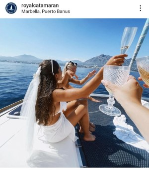 a person sitting on a boat in the water