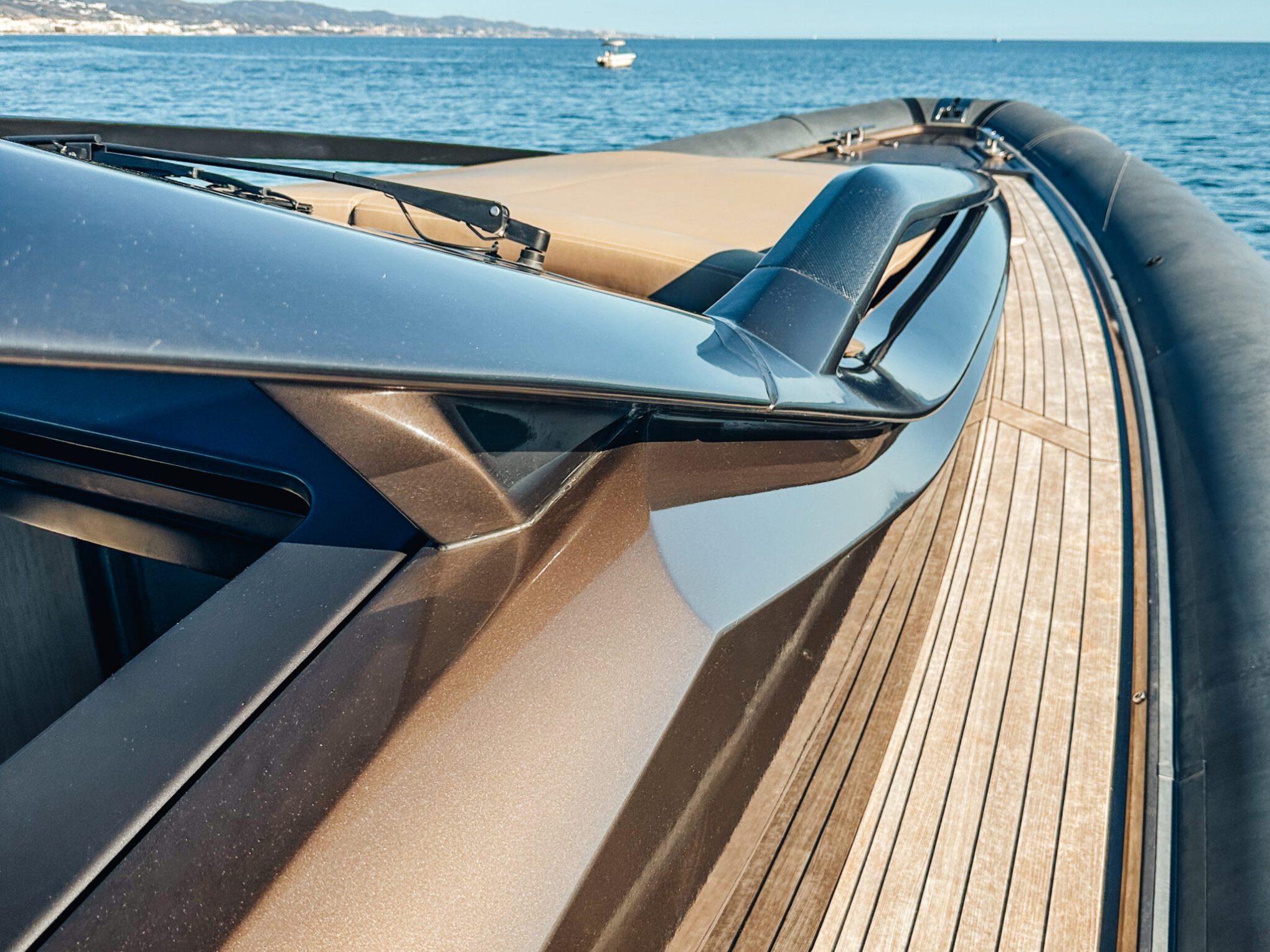 a car parked next to a body of water
