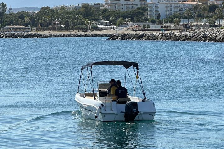 a small boat in a body of water