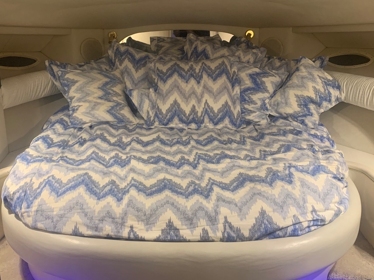 a bed with a blue background