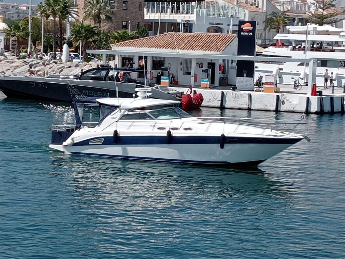 a small boat in a large body of water