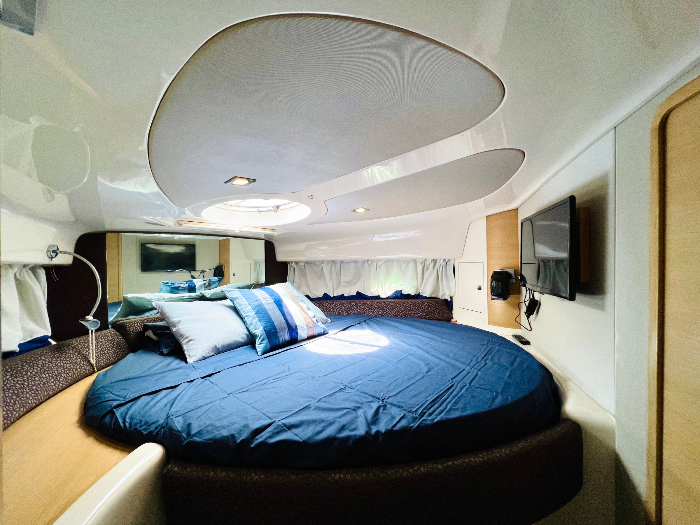 a bedroom with a large bed sitting in a room