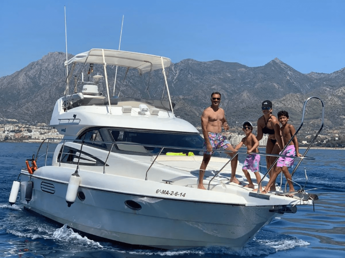 a group of people on a boat in the water