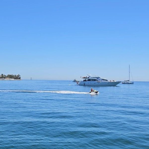 a small boat in a large body of water