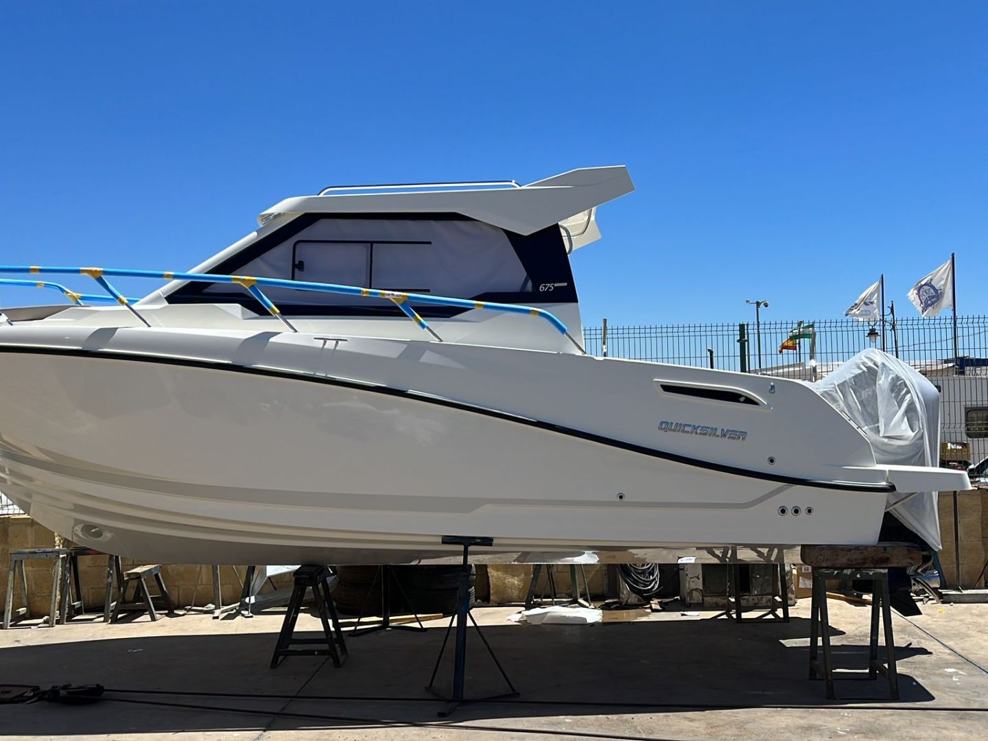 a boat sitting on top of a ramp