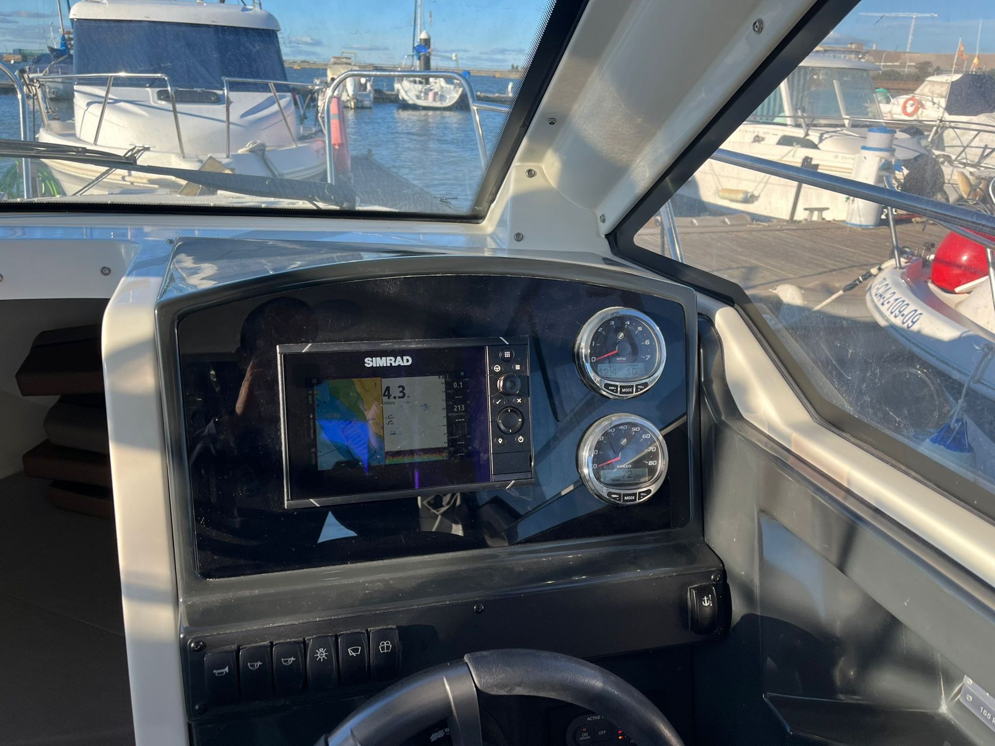 a boat sitting on top of a car