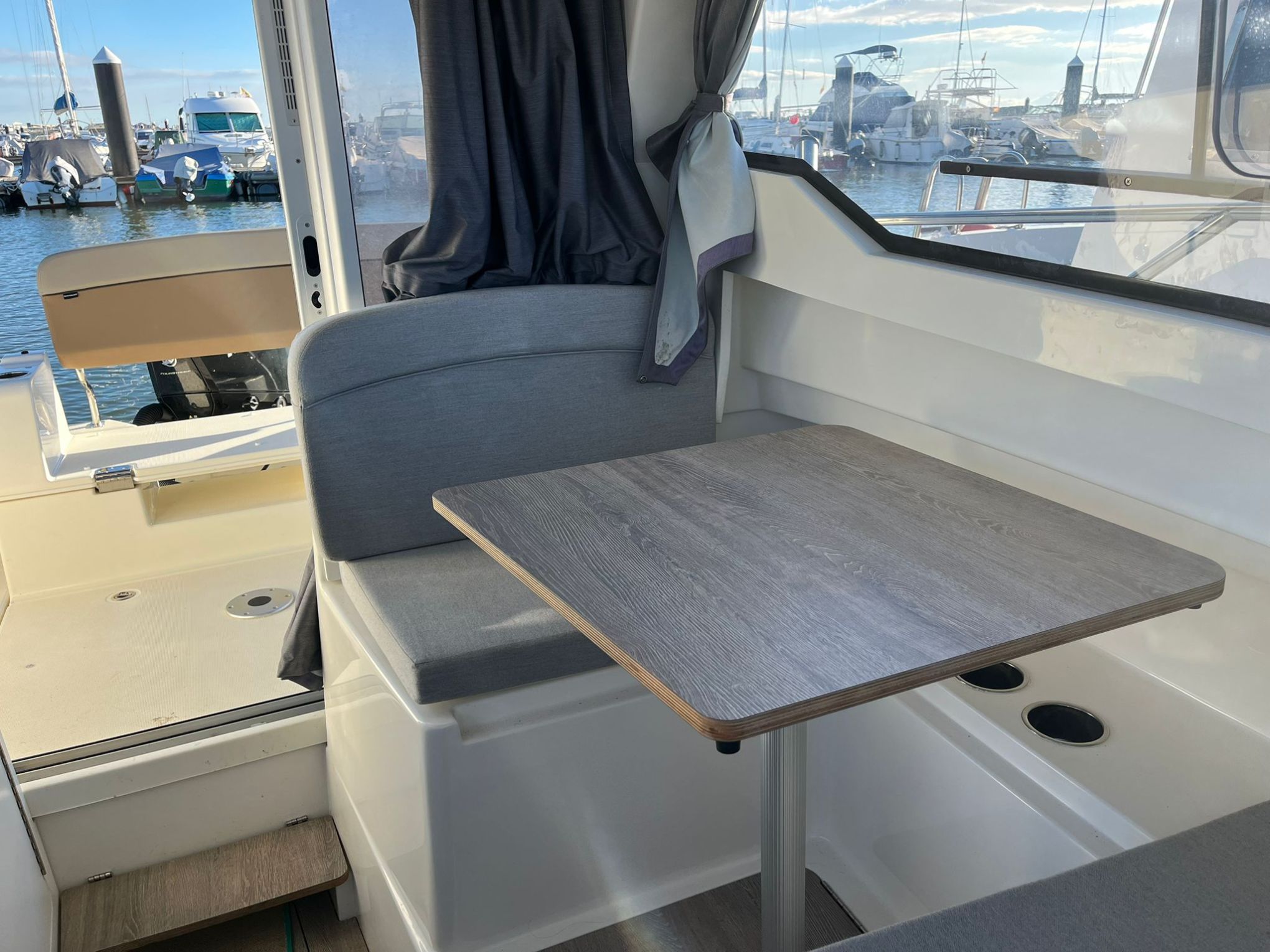 a close up of a boat next to a window