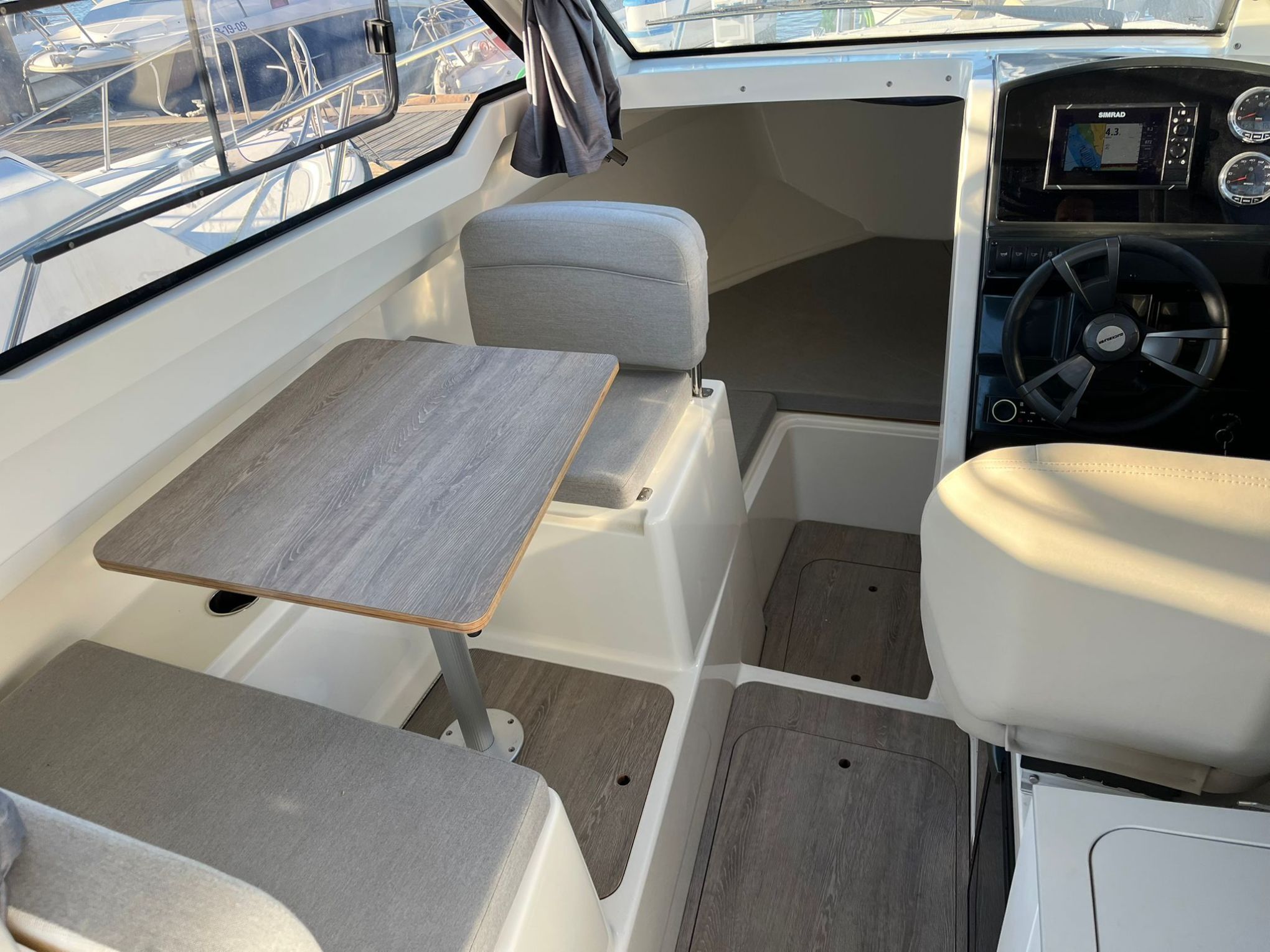 a boat sitting on top of a car